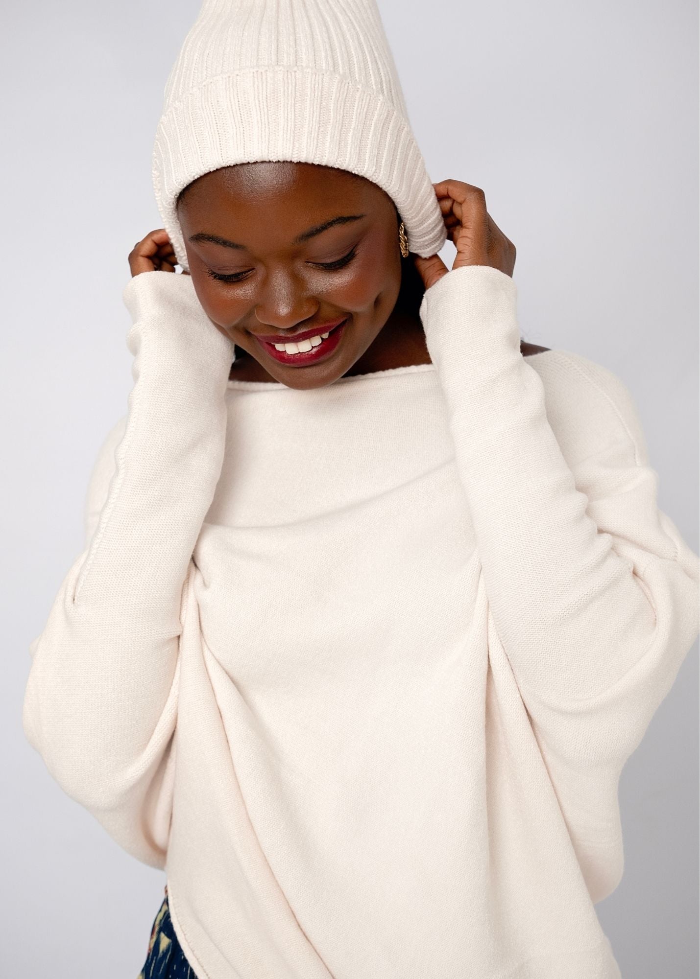 Urban Cozi Asymmetrical Sweater in Cream