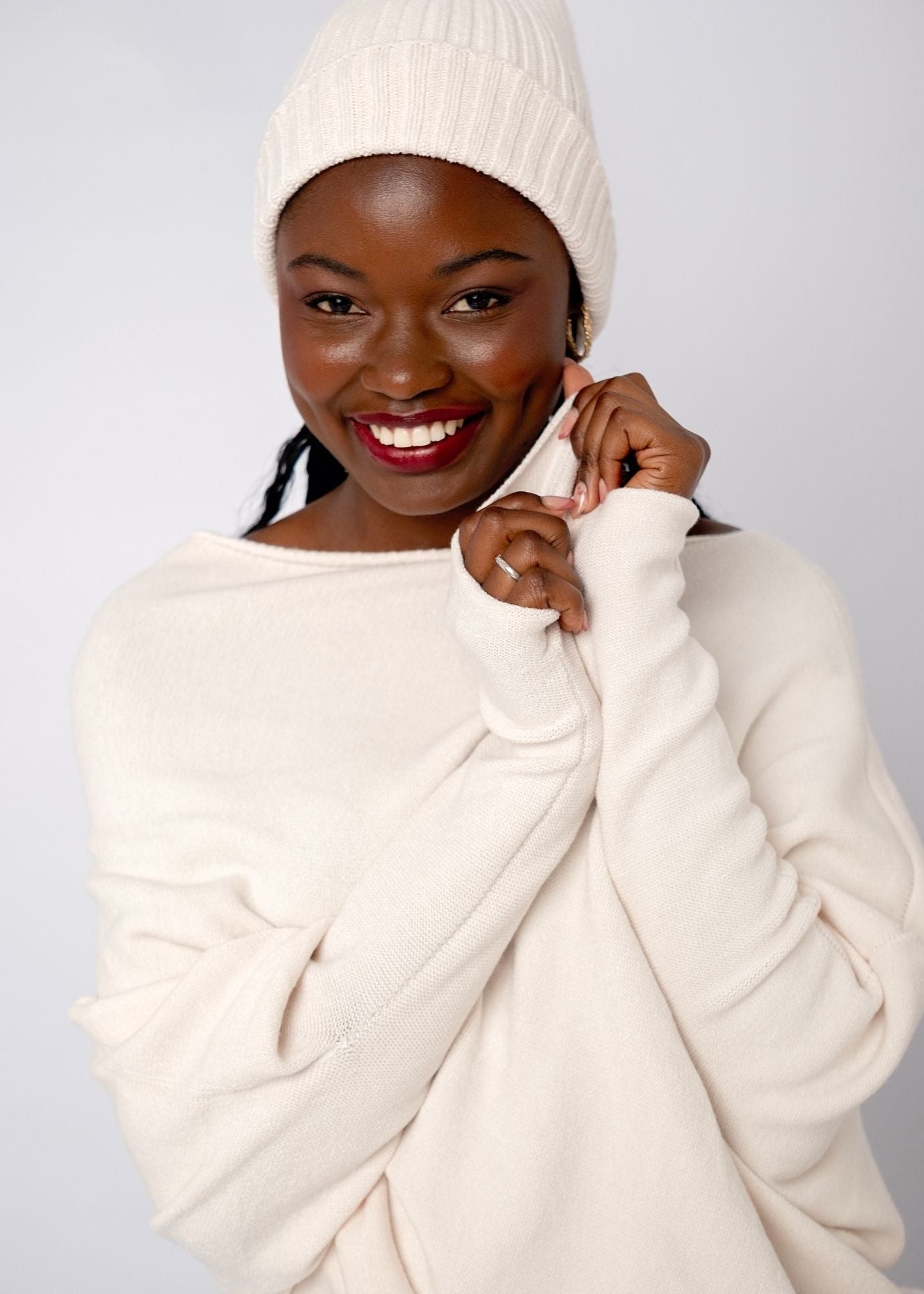Urban Cozi Asymmetrical Sweater in Cream